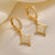 CR Charms Aretes Destellos Elegantes, Acero