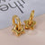 CR Charms Aretes Estrellas Brillantes, Acero