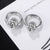 CR Charms Aretes Calaveras Plateadas, Acero